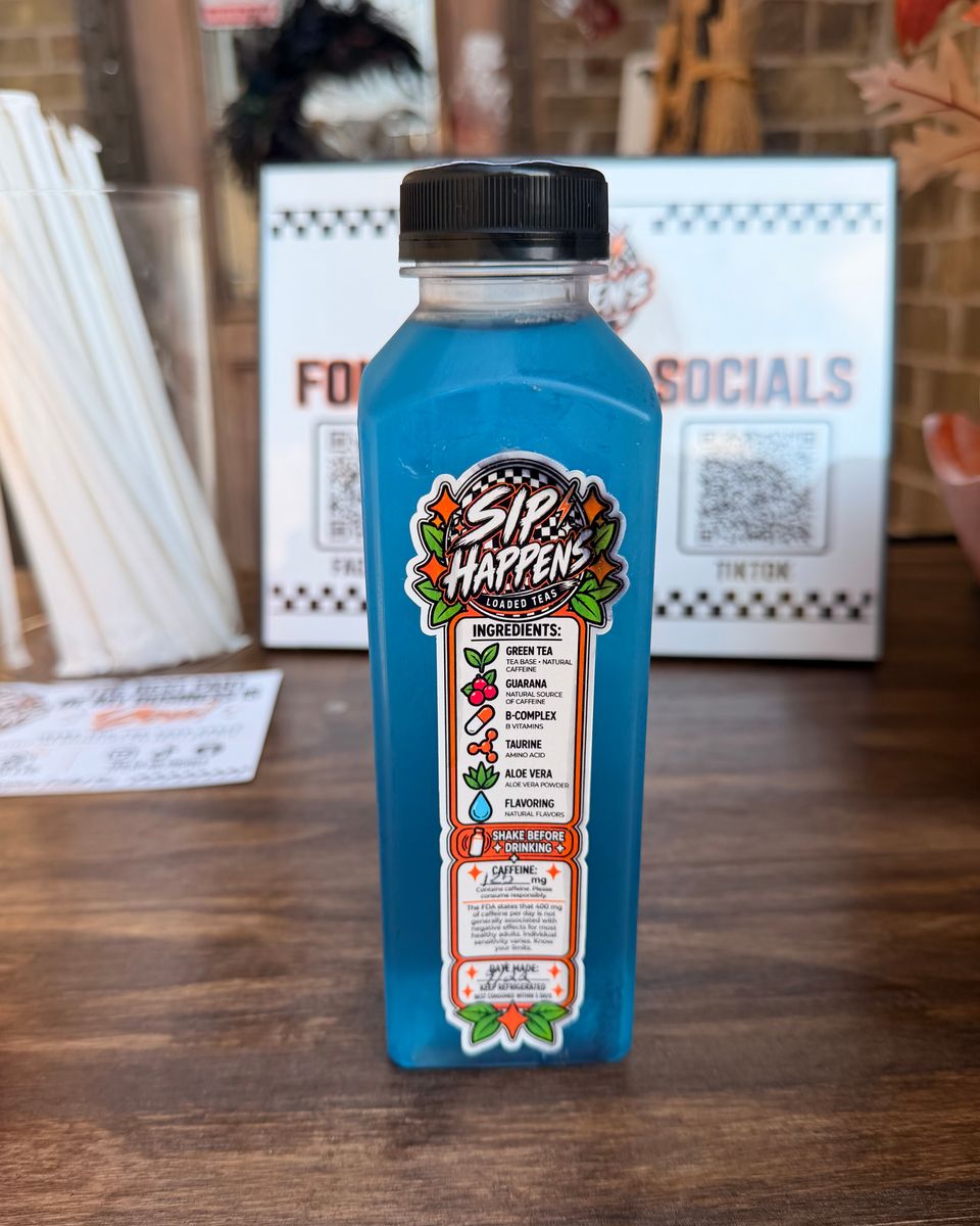 Real Blue Raspberry loaded tea bottle with its original Sip Happens label