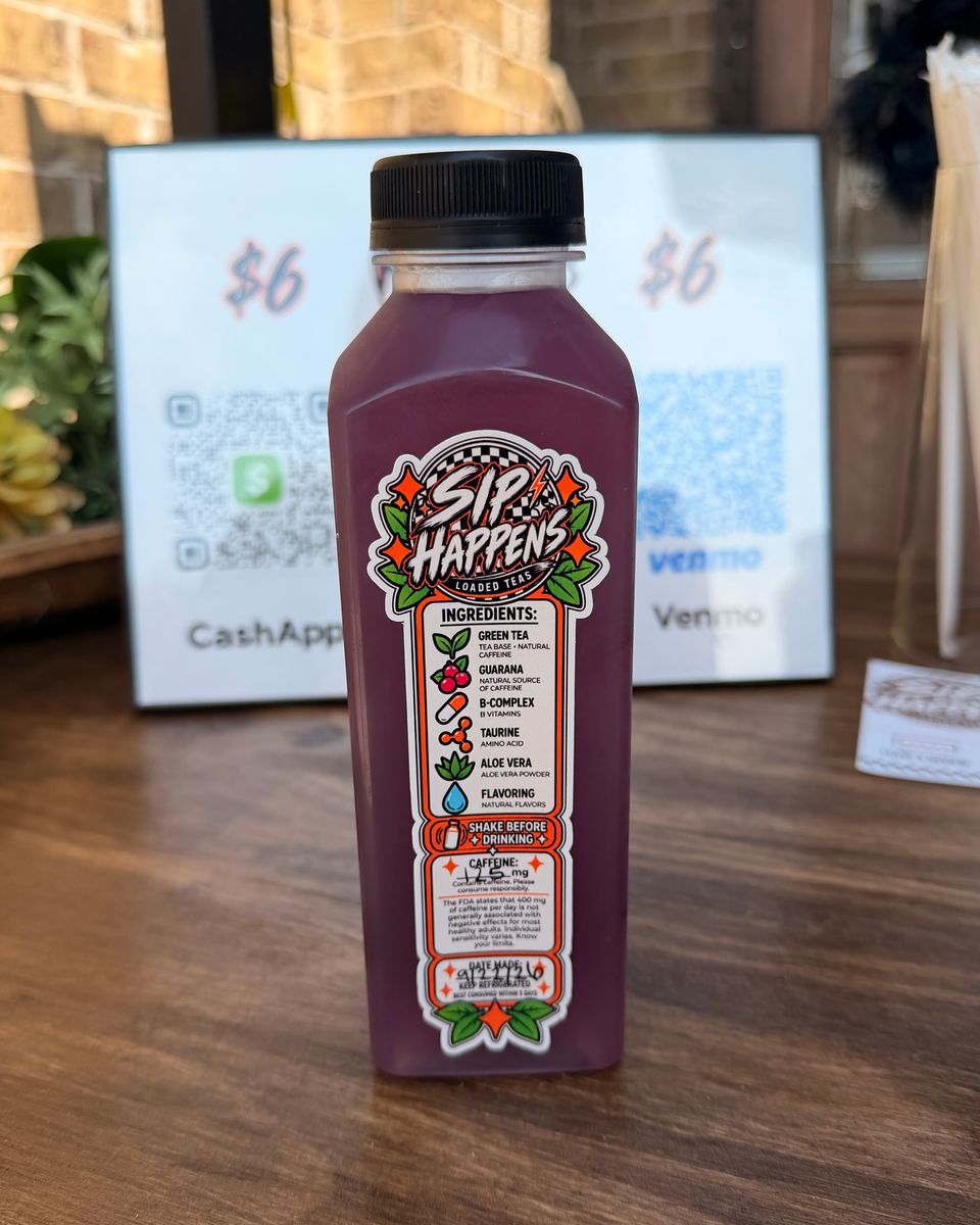 Real purple Grape Escape bottle on the stand counter